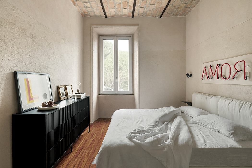 Modernized loft-style bedroom with exposed brick ceiling, large windows, and minimalist decor.