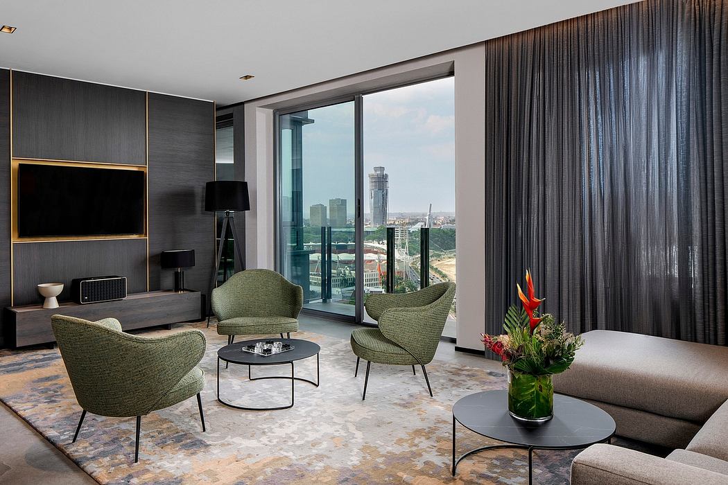 Sleek, modern living room with large windows, plush green chairs, and a cityscape view.
