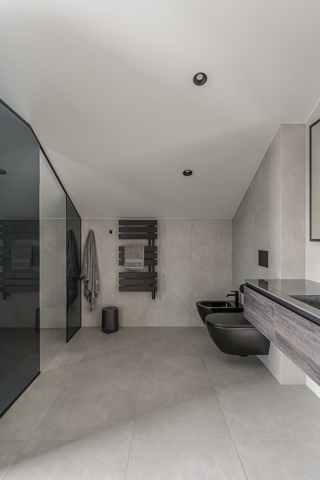 Minimalist bathroom design with clean lines, muted colors, and sleek fixtures.