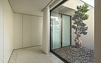013-hc-house-harmonizes-with-nature-in-braga.jpg