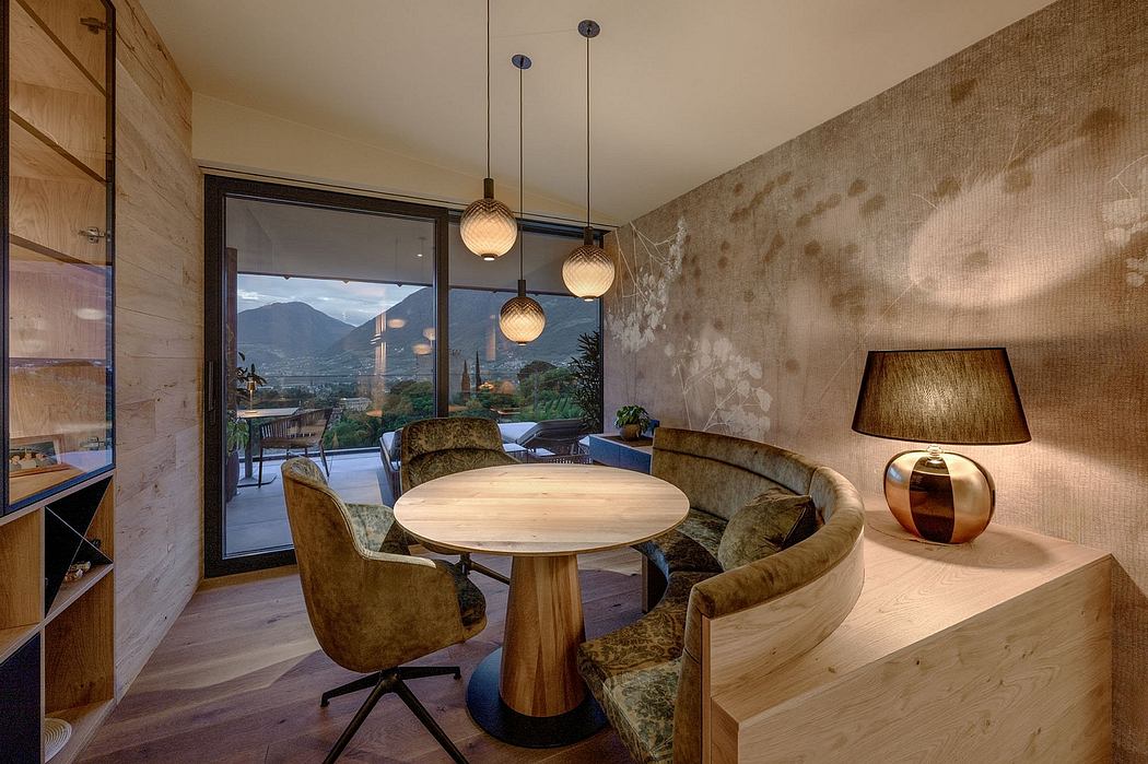 Warm lighting, natural materials, and mountain views create a cozy, modern ambiance.