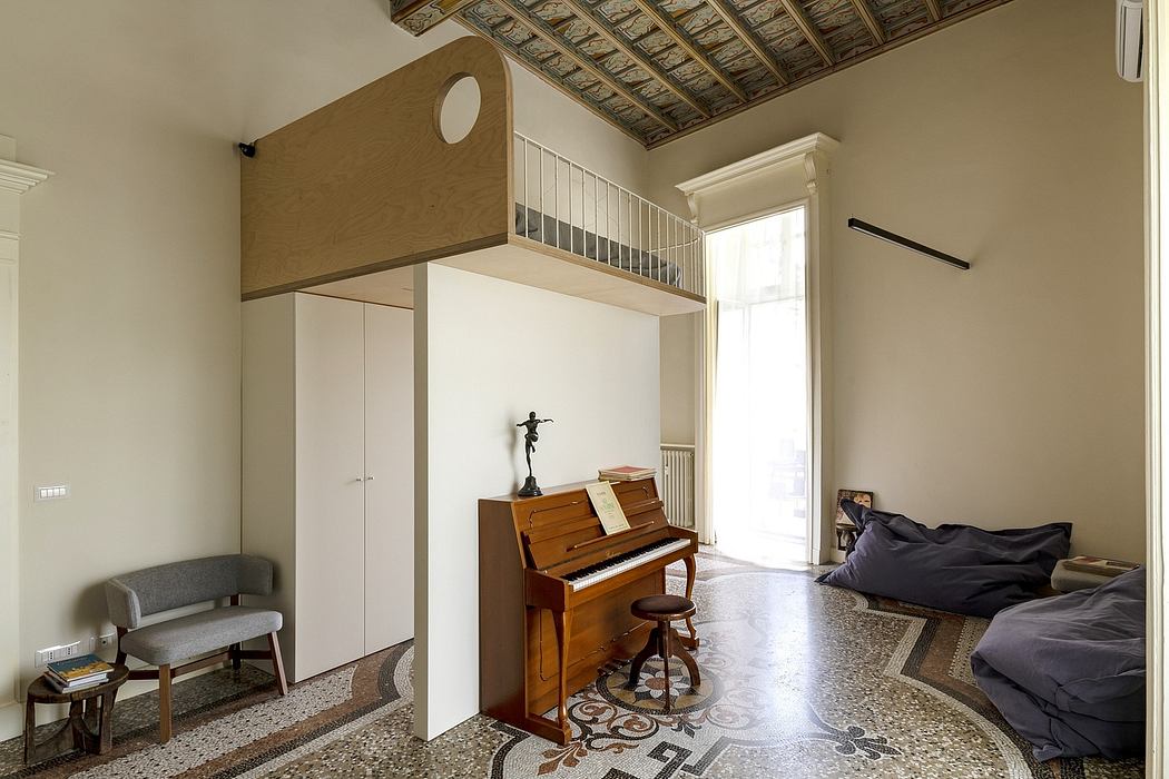 Ornate ceiling, built-in furniture, and decorative floor tiles create a vintage ambiance.