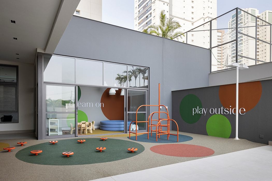 Vibrant modern play area with bold colors, geometric shapes, and nature-inspired elements.