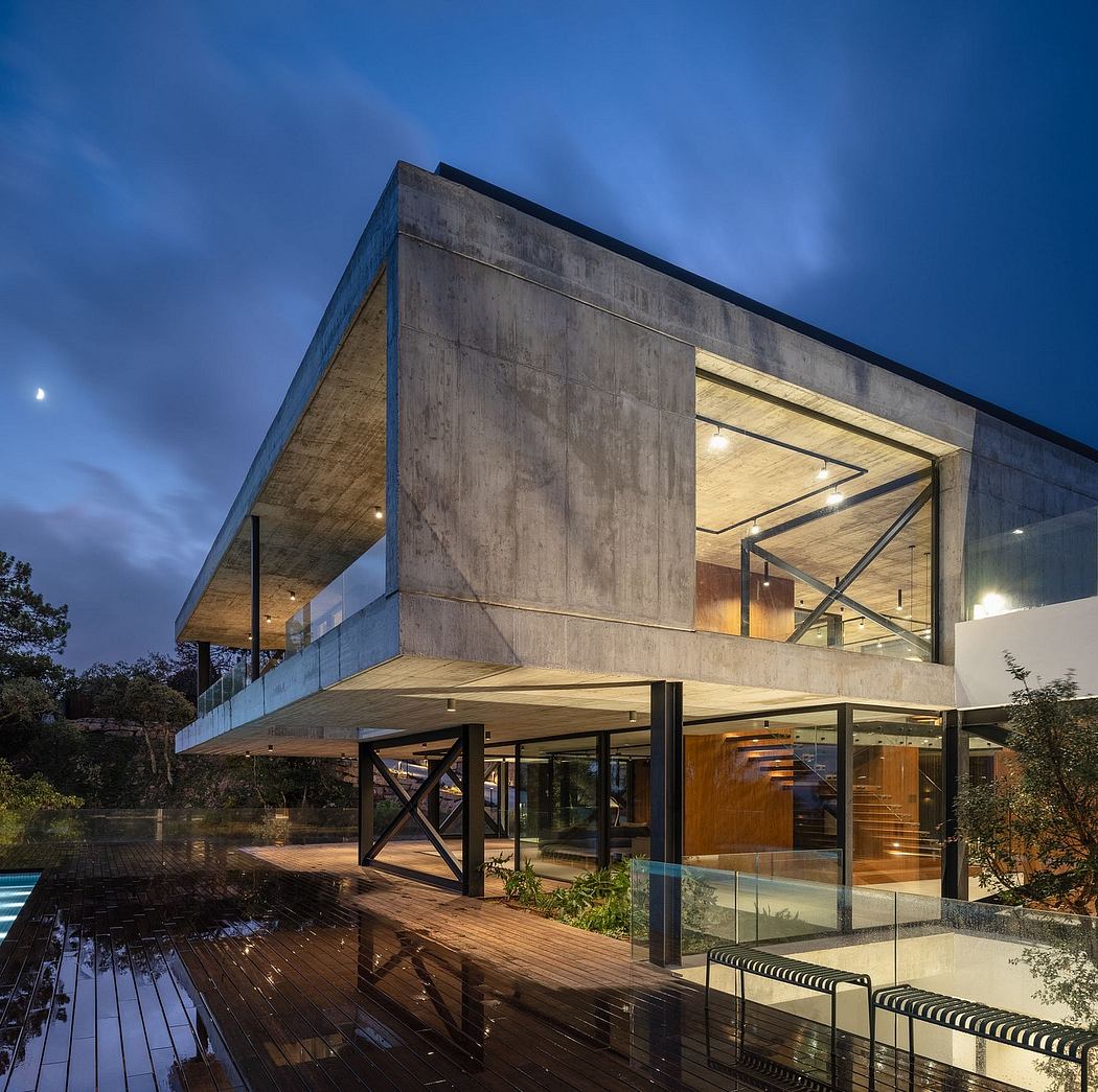 Striking modern architecture featuring concrete, glass, and wood elements.
