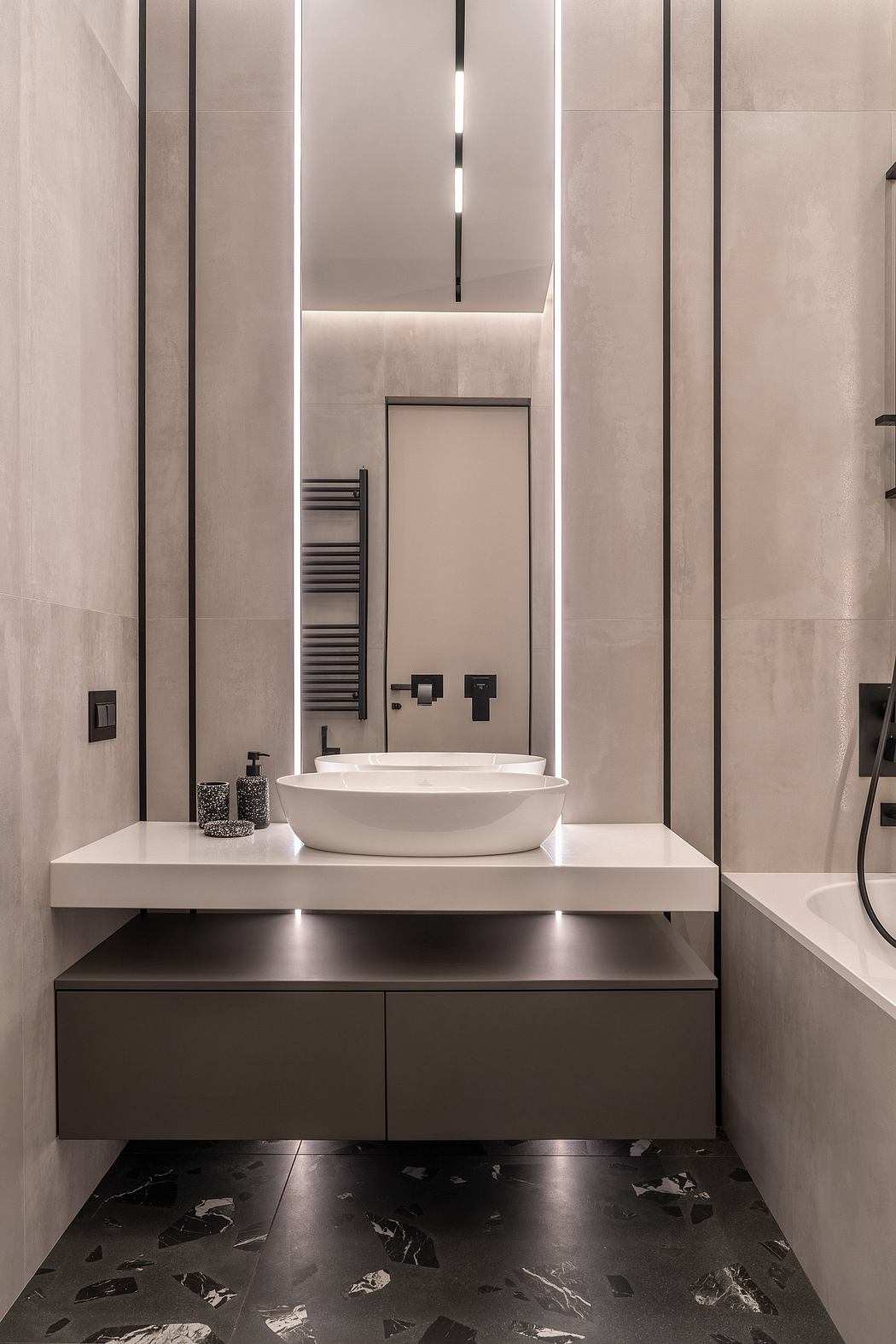 Sleek, minimalist bathroom design with a floating vanity, vessel sink, and recessed lighting.