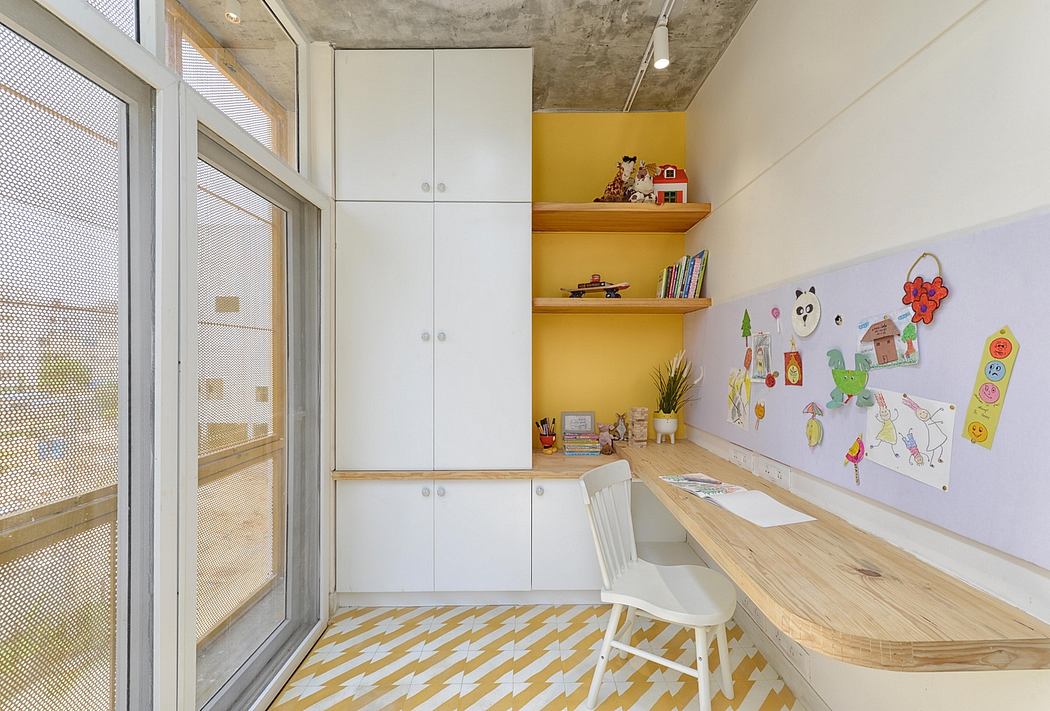 Bright, modern home office with wood accents, shelving, and vibrant yellow wall.