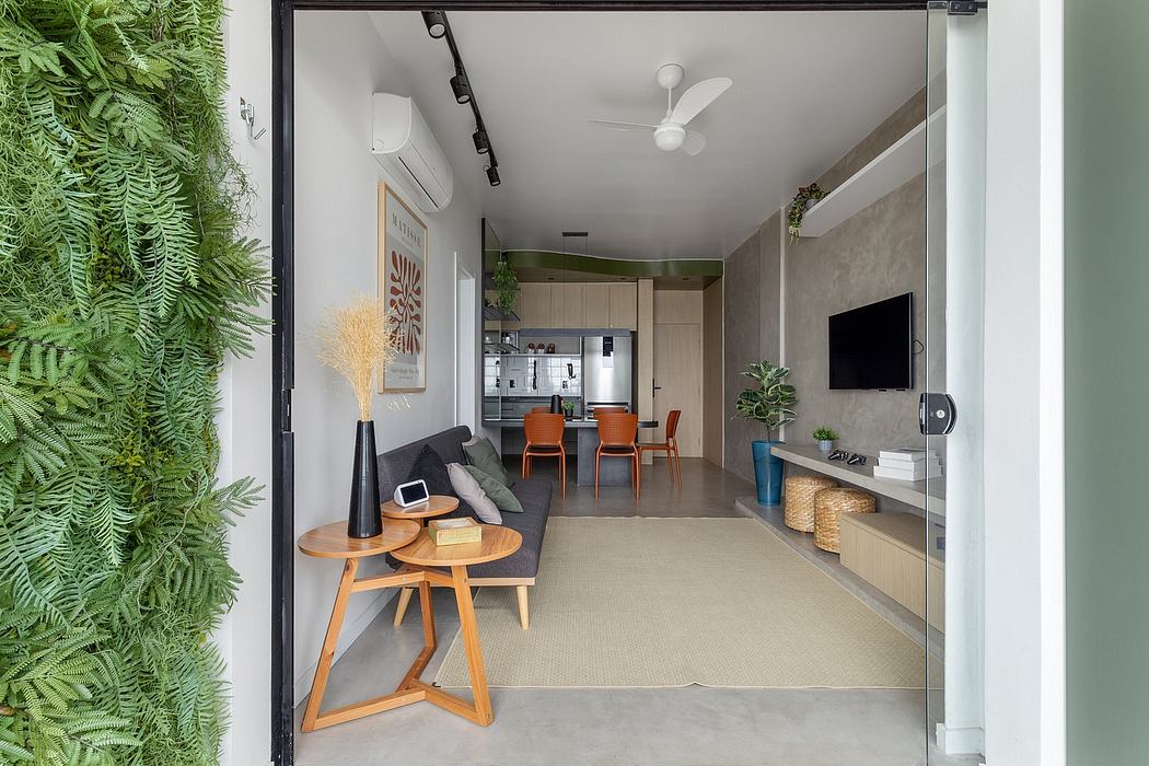 Sleek, modern apartment with minimalist furniture, lush greenery, and natural light.