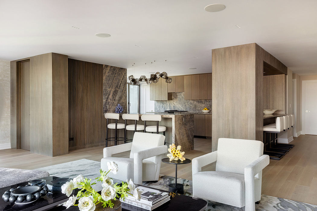 Sleek, contemporary interior design featuring wood paneling, modern lighting, and open floor plan.