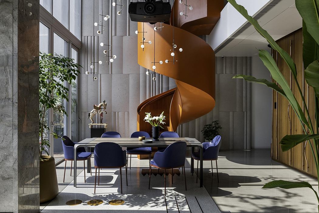 Striking modern dining space with spiral lighting fixture, sleek furniture, and bold colors.