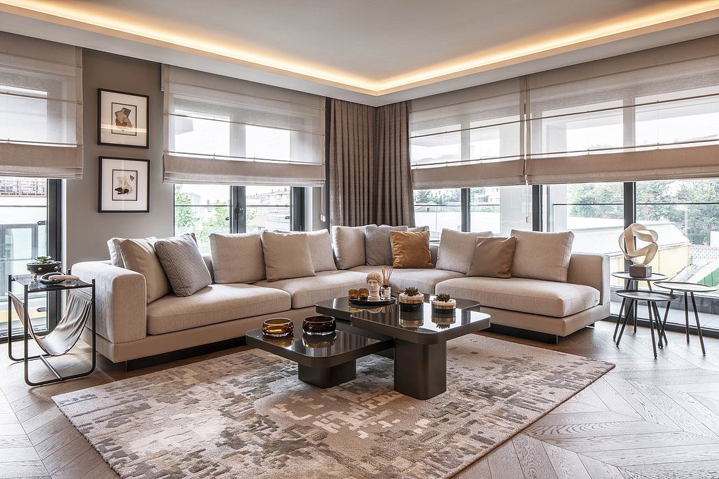 Spacious living room with modern furniture, large windows, and a stylish, neutral color palette.