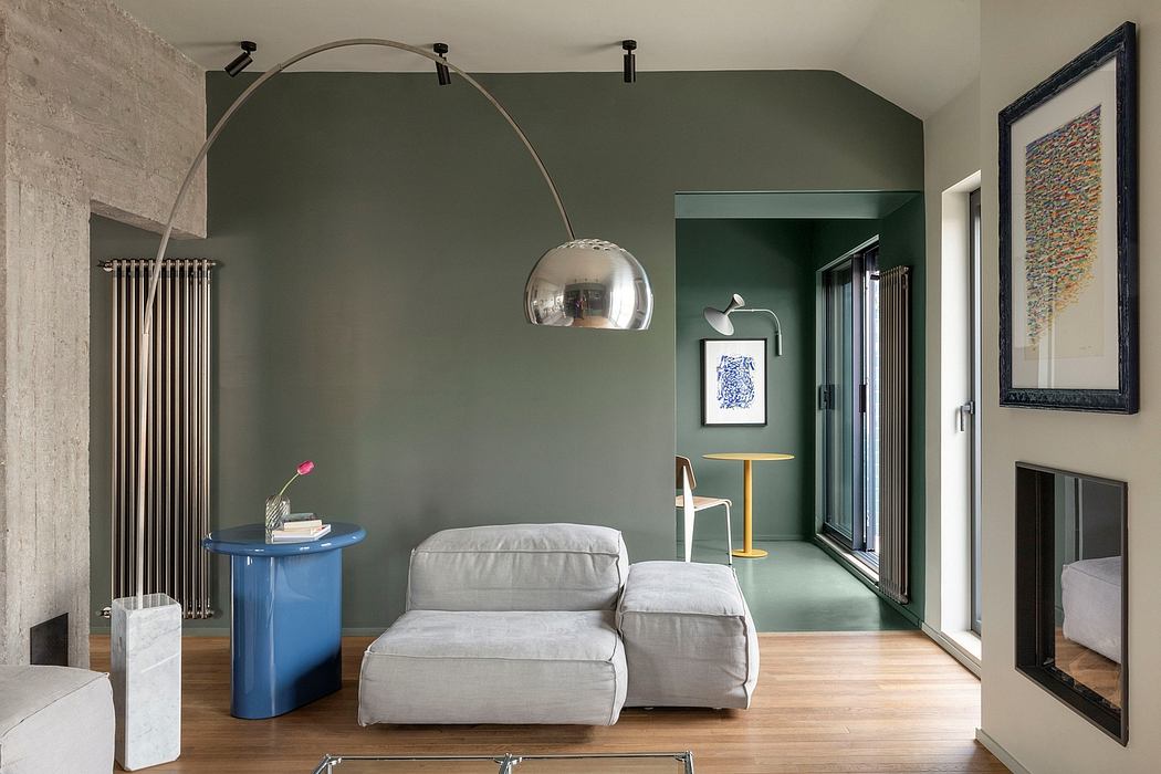 Spacious, open-concept living area with vibrant color palette, modern lighting, and sleek furniture.