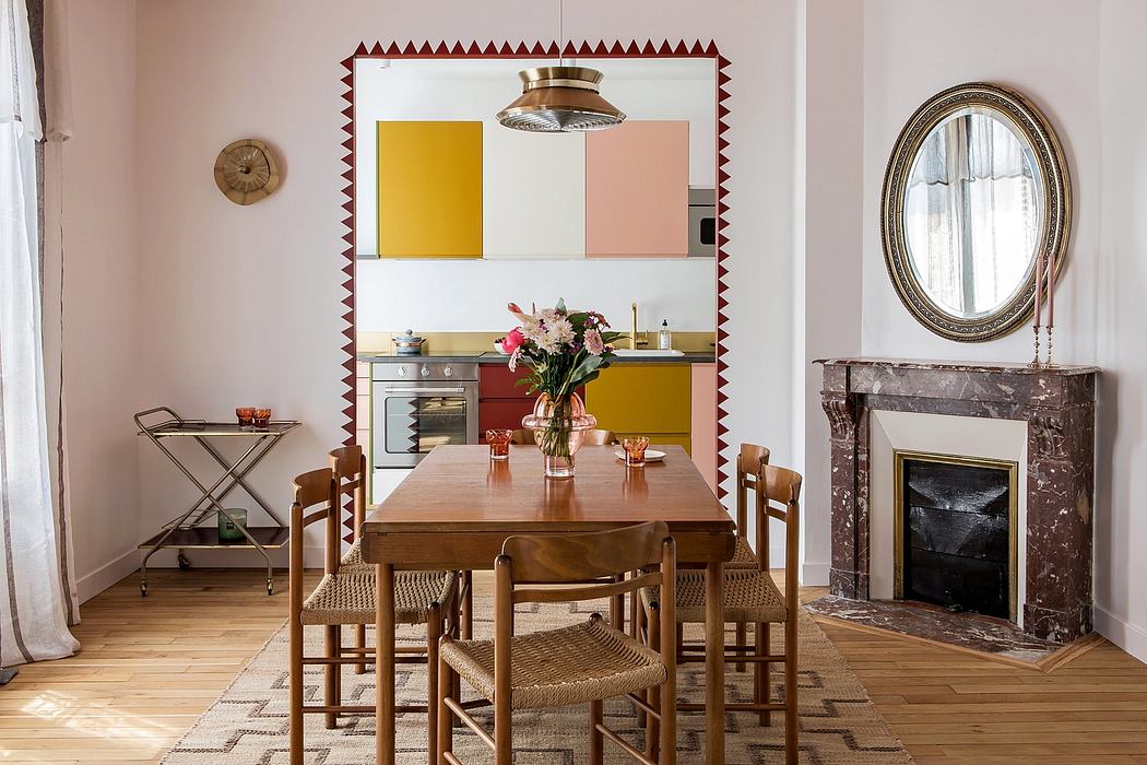 Vibrant, retro-inspired kitchen with statement wall, marble fireplace, and stylish furnishings.