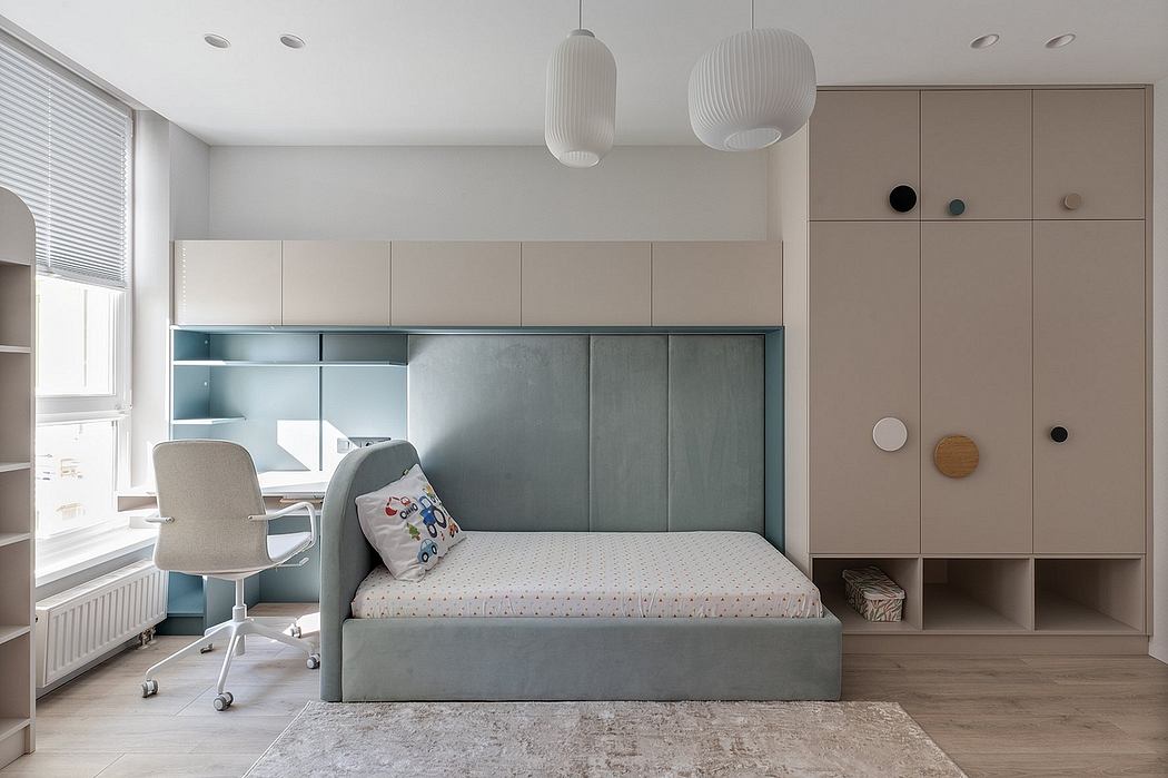 Well-designed bedroom with modern furniture, built-in storage, and pendant lighting.