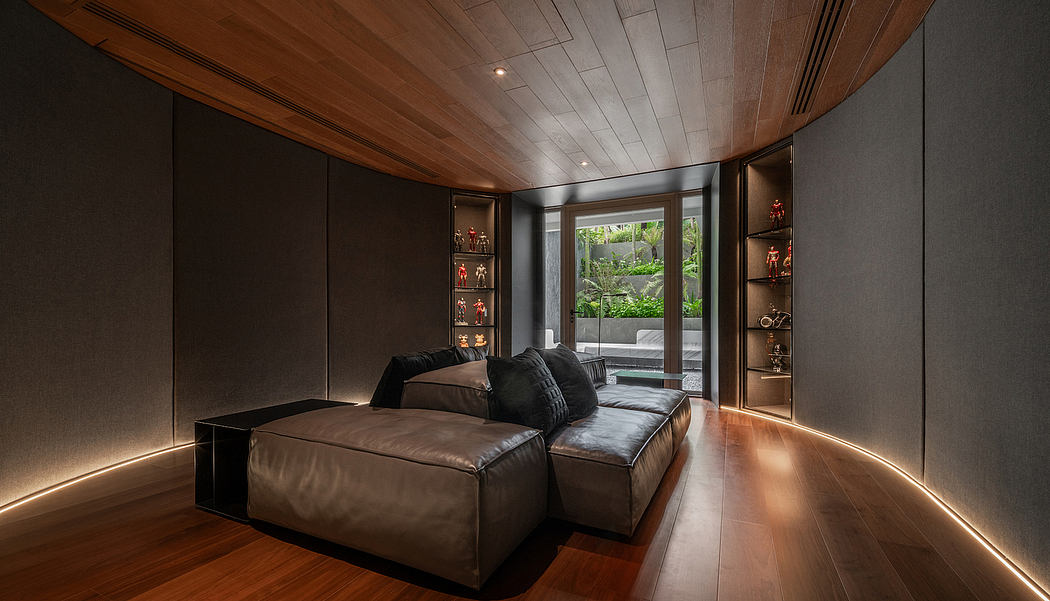 A modern, minimalist living room with wooden ceiling, curved couch, and shelving with figurines.