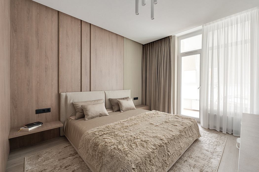 Sleek and modern bedroom with wooden paneling, plush bedding, and recessed lighting.