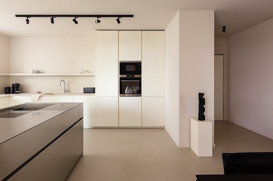 A contemporary kitchen with clean lines, minimalist design, and integrated appliances.
