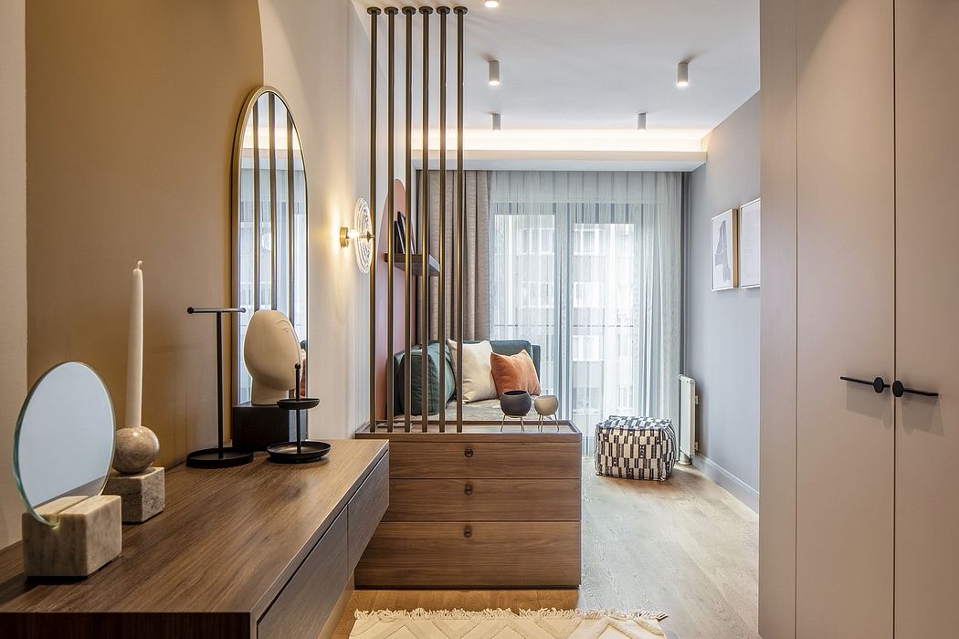 Elegant entryway with arched mirror, wooden console, and modern lighting fixtures.