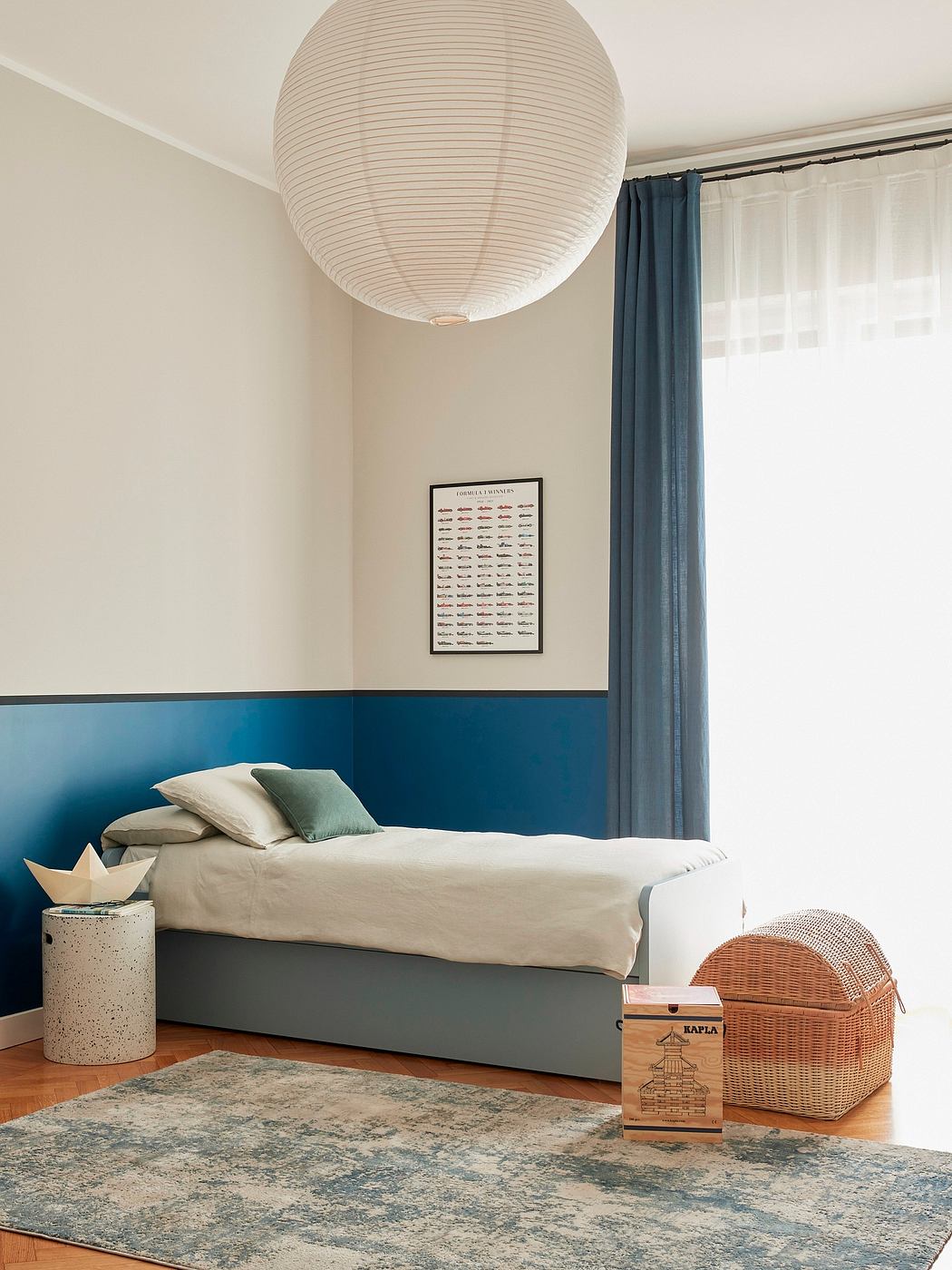 Spacious bedroom with modern, minimalist design elements and natural textures.