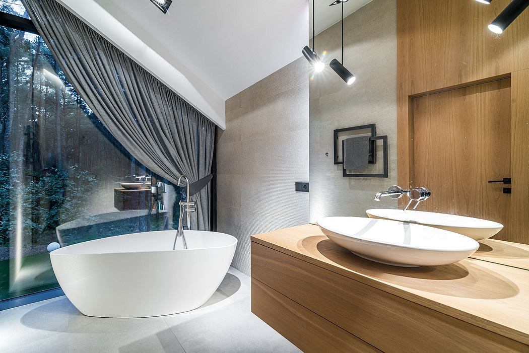 Modern bathroom with freestanding tub, vessel sink, and wooden vanity design.