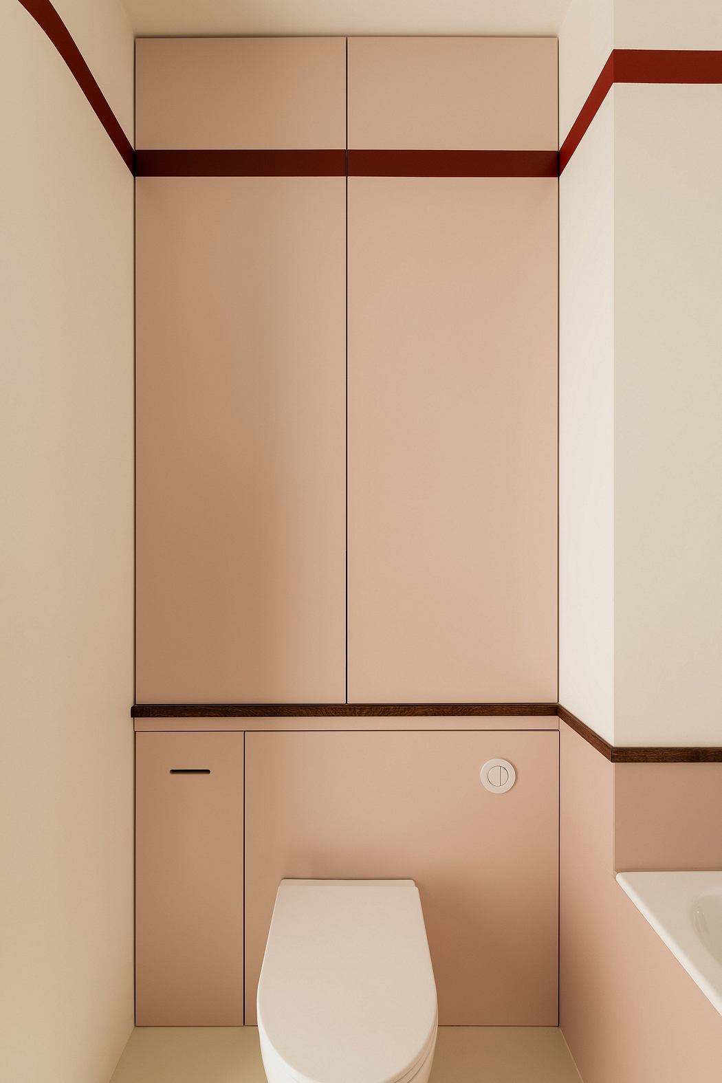 Minimalist bathroom design with sleek cabinets, neutral color palette, and wooden accents.