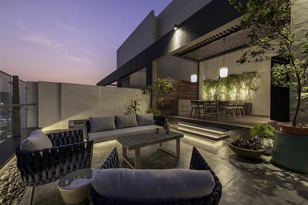 Sleek, contemporary outdoor patio with wooden accents, stone floors, and hanging lanterns.