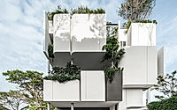 021-arq10-by-idin-architects-creates-vertical-flow-of-greenery-in-urban-setting.jpg