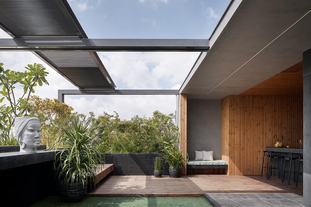 Sleek, modern architecture with a lush, verdant outdoor terrace and wooden accents.
