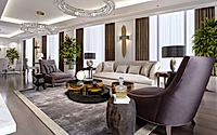 A modern, classic-style hotel room with a lounge and dining area and designer furniture.