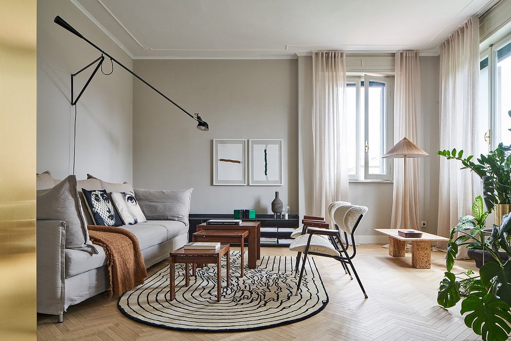 Cozy living room with modern furnishings, warm lighting, and natural textures.