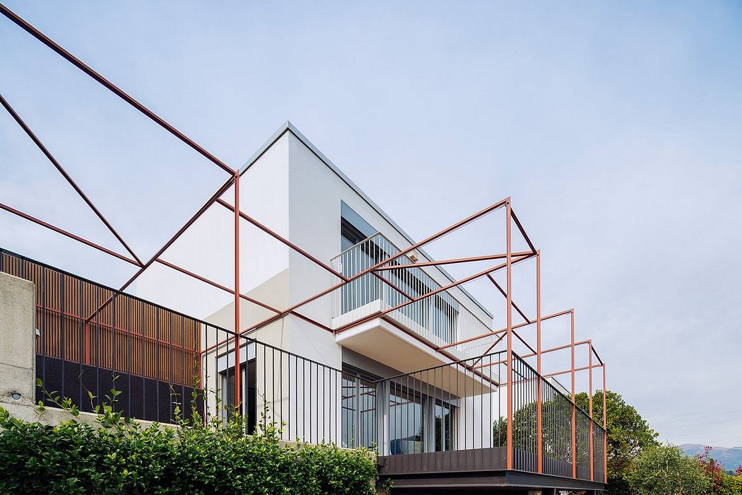 Modern architectural design with bold, geometric shapes and copper-colored frames.