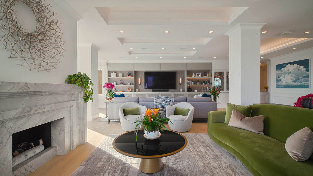 Bright, modern living room with built-in cabinetry, marble fireplace, and colorful furnishings.