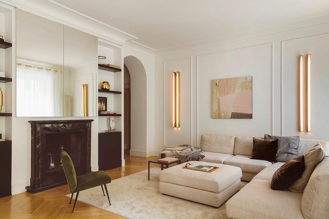 Elegant, modern living room with neutral tones, artful lighting, and antique fireplace.