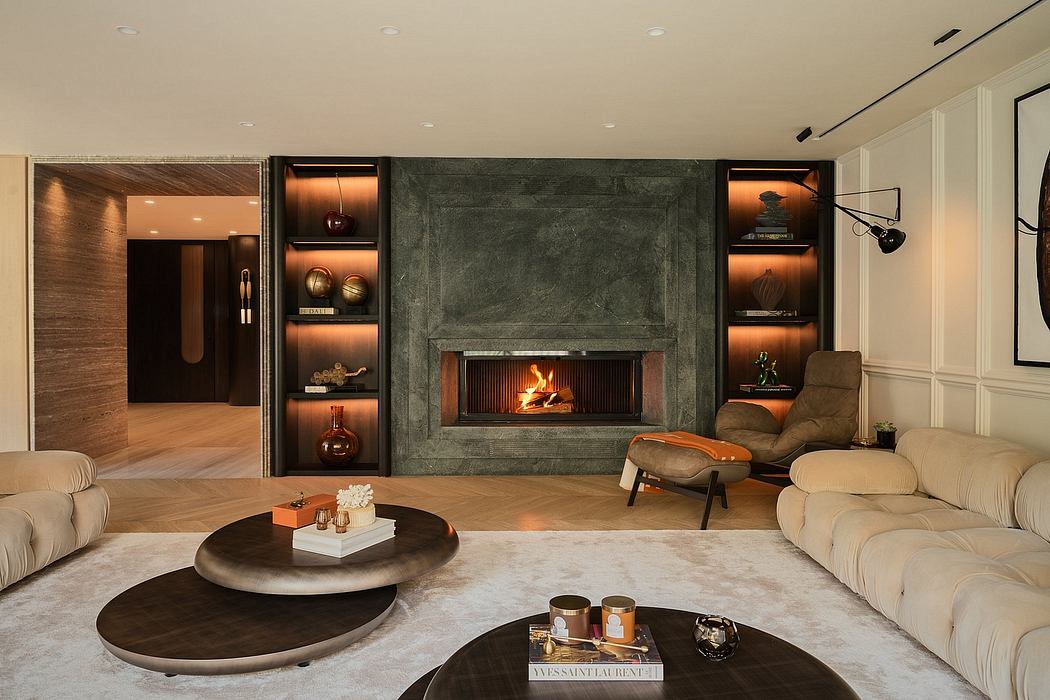 Cozy living room with modern stone fireplace, built-in shelving, and plush seating.