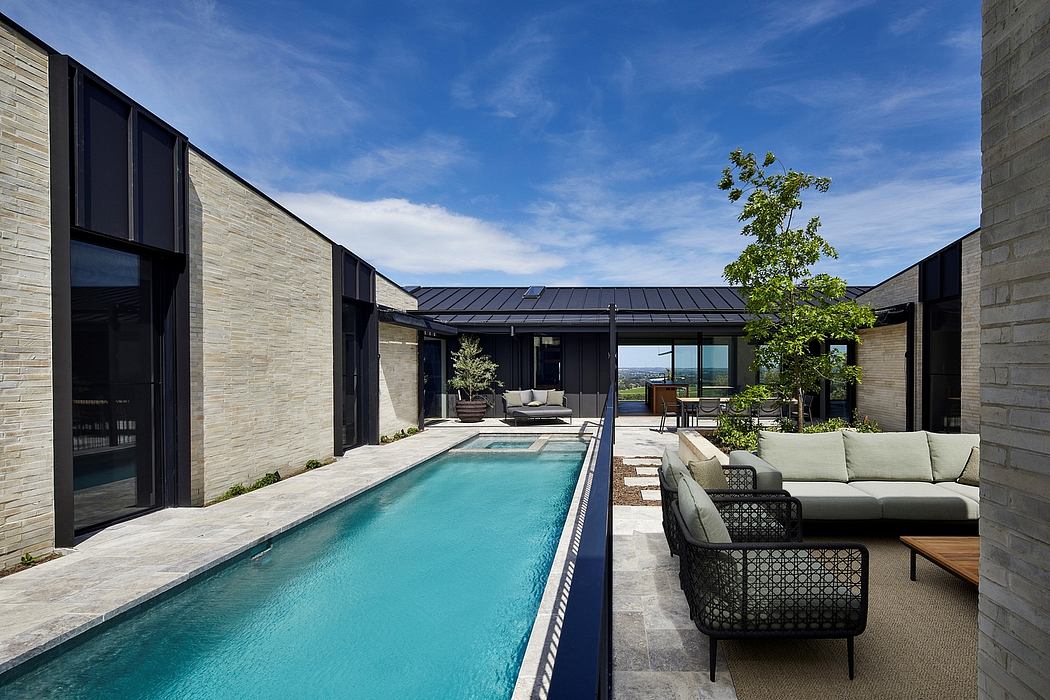 Sleek, modern architecture with a stunning pool and stylish outdoor living space.