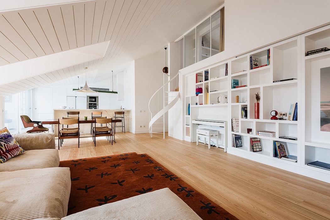 Sleek, modern interior with open-concept layout, wood floors, and a striking shelving unit.