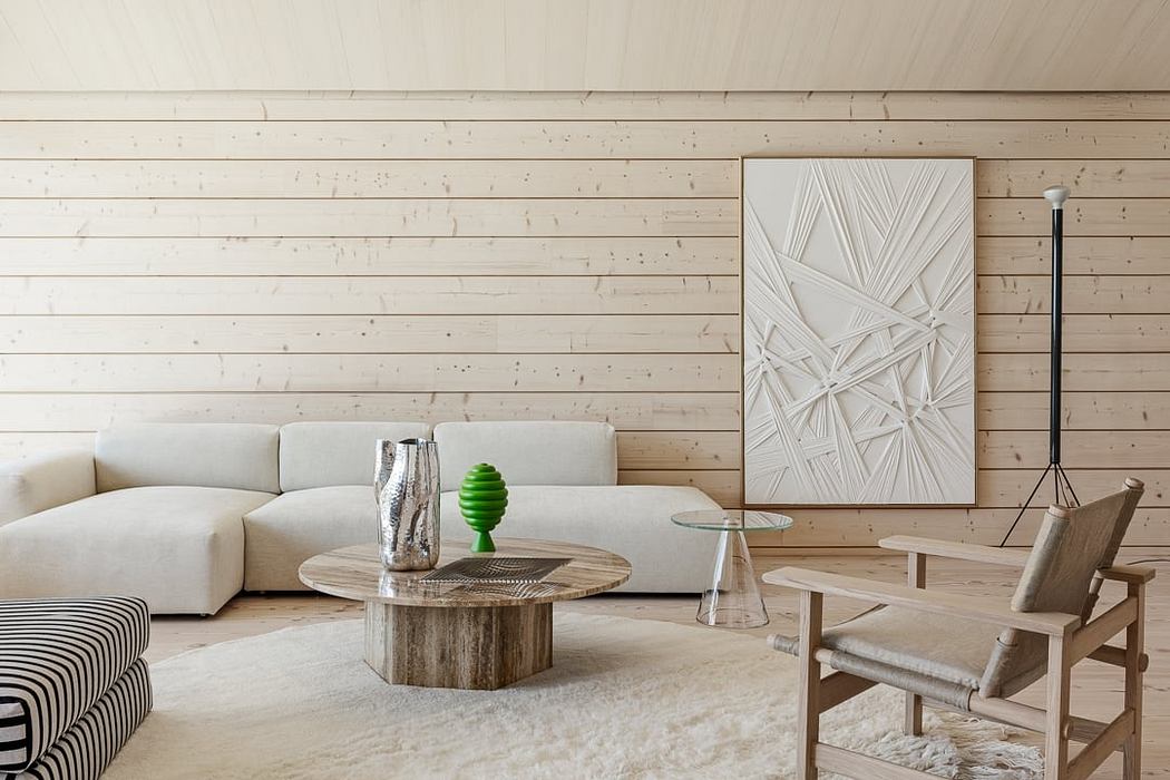 Minimalist living room with wood-paneled walls, geometric artwork, and eclectic furnishings.
