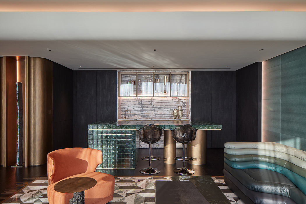 Sleek, modern interior featuring geometric tiles, metallic accents, and cozy seating.