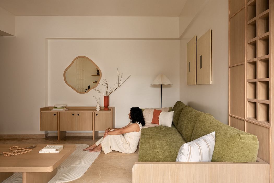 Tranquil living space with neutral tones, natural wood furnishings, and minimalist decor.