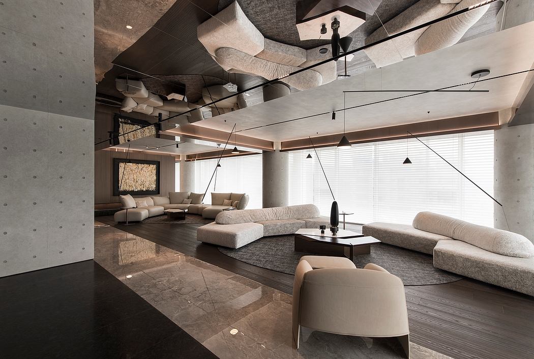 A modern, spacious living room with unique concrete ceiling features and sleek furnishings.