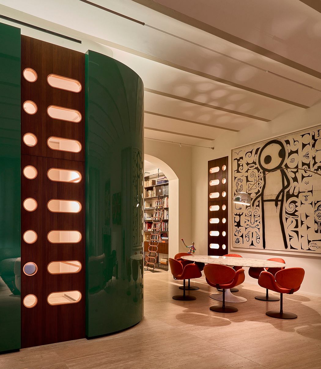 Striking green and red architectural elements, sleek modern furniture, and bold abstract wall art.