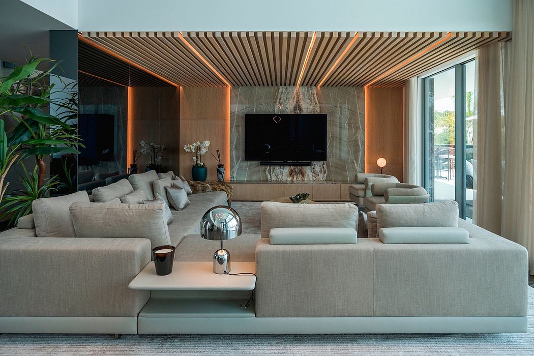 Expansive living room with sleek wood-paneled ceiling, plush seating, and modern furnishings.