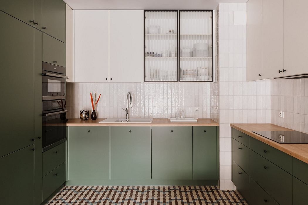 Sleek, modern kitchen with olive green cabinets, wooden countertops, and frosted glass dividers.