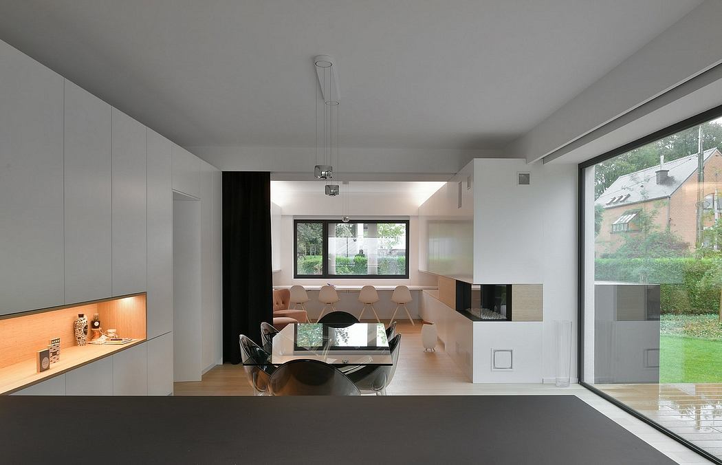 A modern, open-plan living space with sleek, minimalist design features.