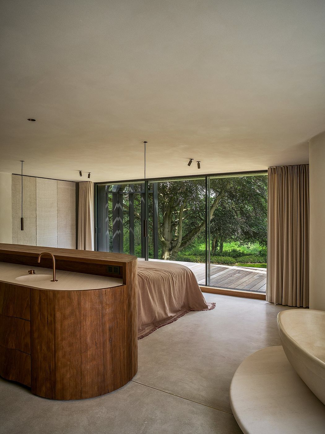 A contemporary bedroom with wooden furnishings, floor-to-ceiling windows, and lush outdoor scenery.
