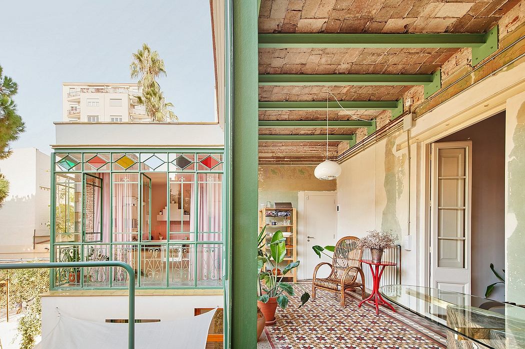 Vibrant Mediterranean-style building with ornate patterned floor and rustic wooden beams.