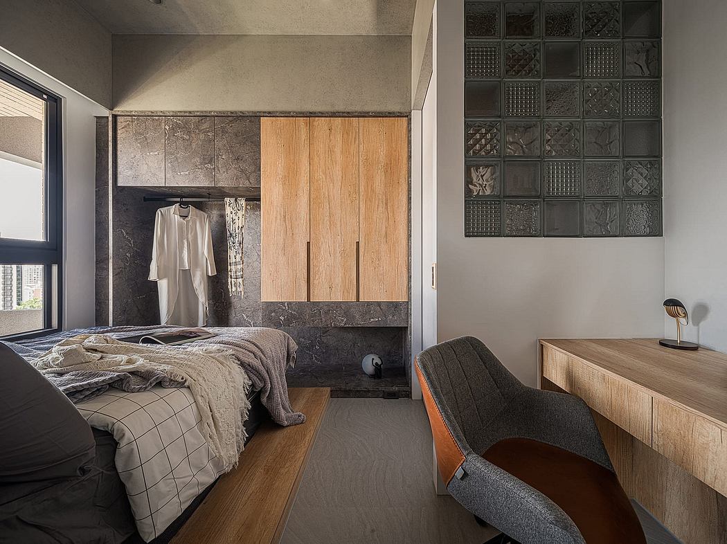 Modern bedroom with natural wood and stone elements, textured walls, and minimal decor.