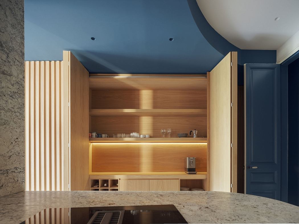 Sleek built-in wood cabinetry and shelves with subtle lighting in a modern kitchen.