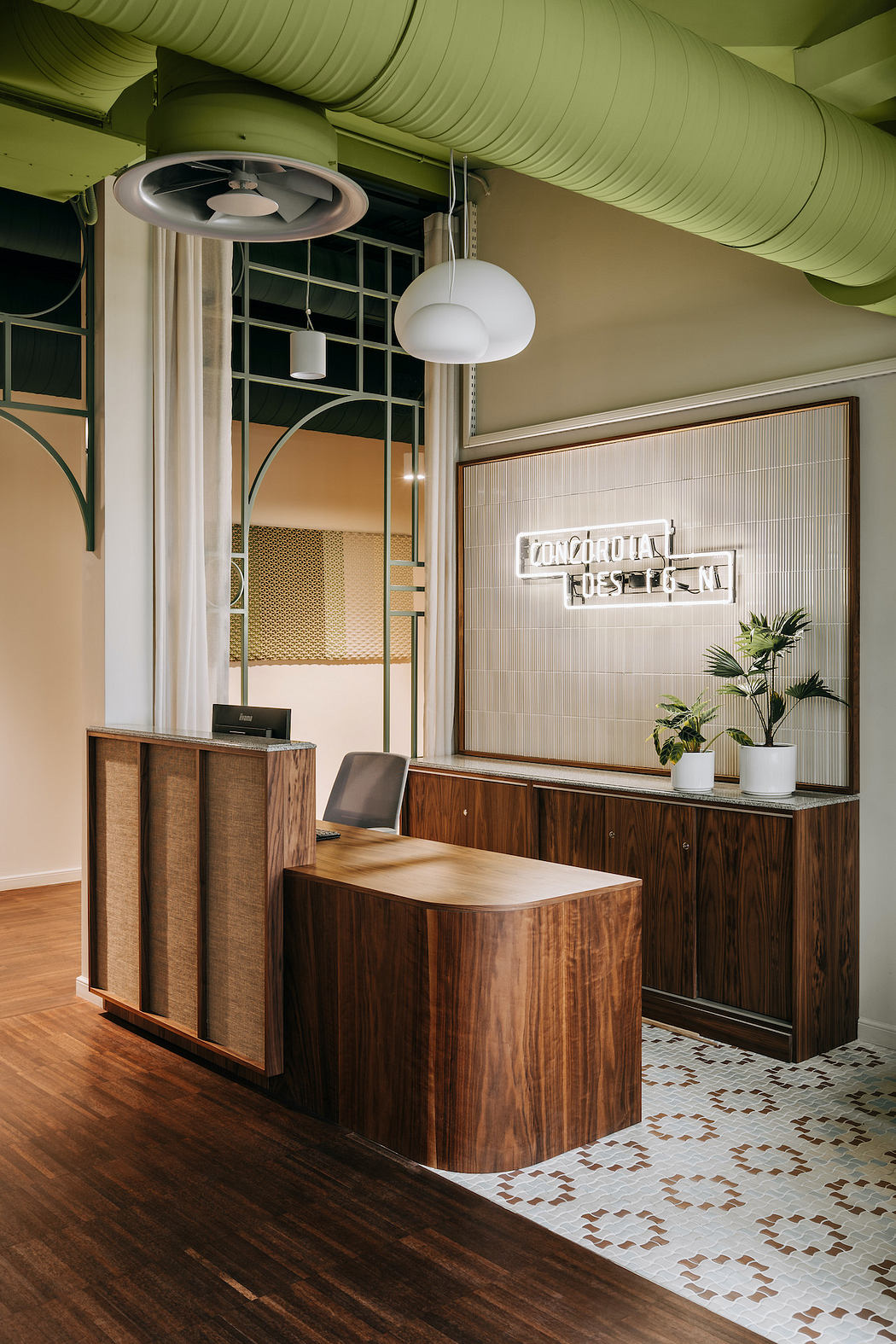 Stylish commercial interior with modern wooden furniture, lighting, and textured walls.