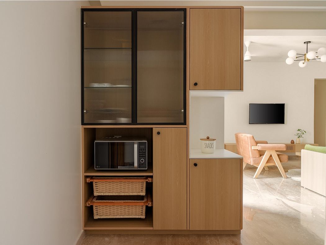 Minimalist wooden cabinetry with glass-paneled doors, microwave, and storage baskets.