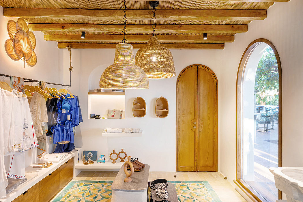 Rustic wooden beams, pendant lights, and arch-topped doorway in a cozy retail space.